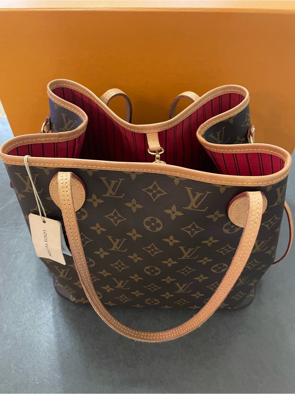 Louis Vuitton Monogram Neverfull Tote — Brown Exterior with Red Interior